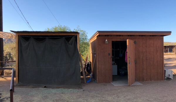 Cotton canvas tarp used as a curtain and divider for sheds and outbuildings.
